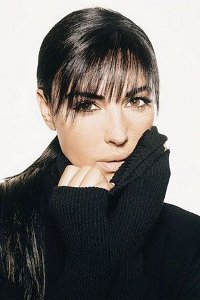 Моника Белуччи в черном свитере