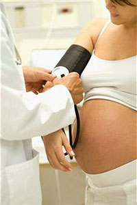 Беременная женщина на приеме у доктора